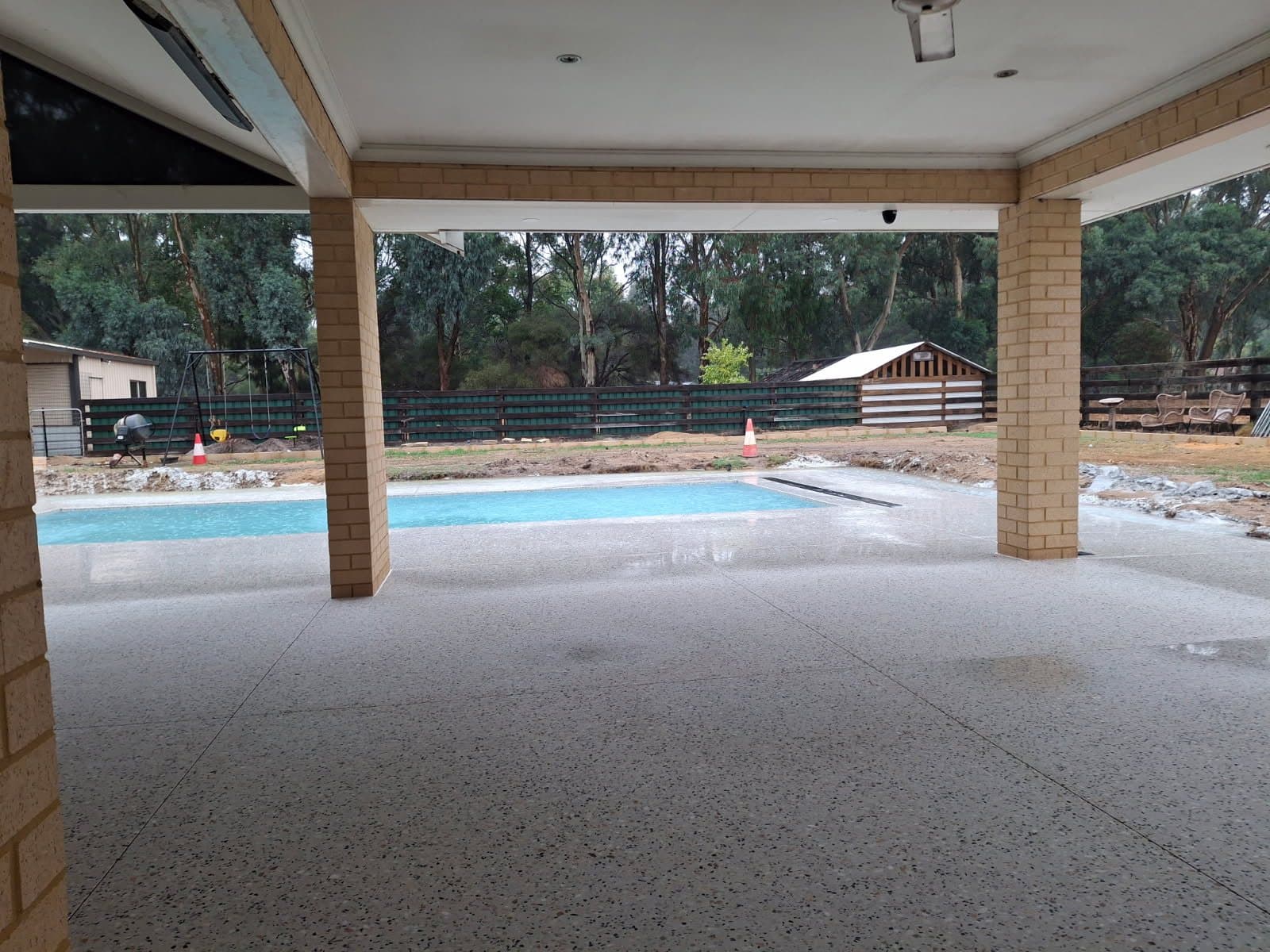 Honed aggregate alfresco and pool surround in Byford