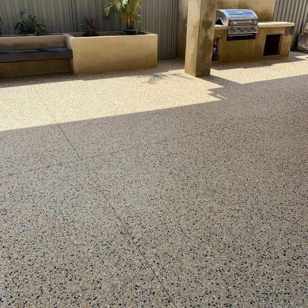 Exposed aggregate patio beside a Perth home