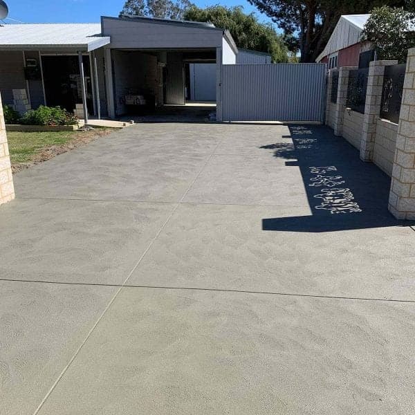 Grey concrete driveway installed in Perth